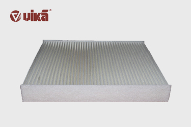 Where can an air conditioner filter element be found on a car?